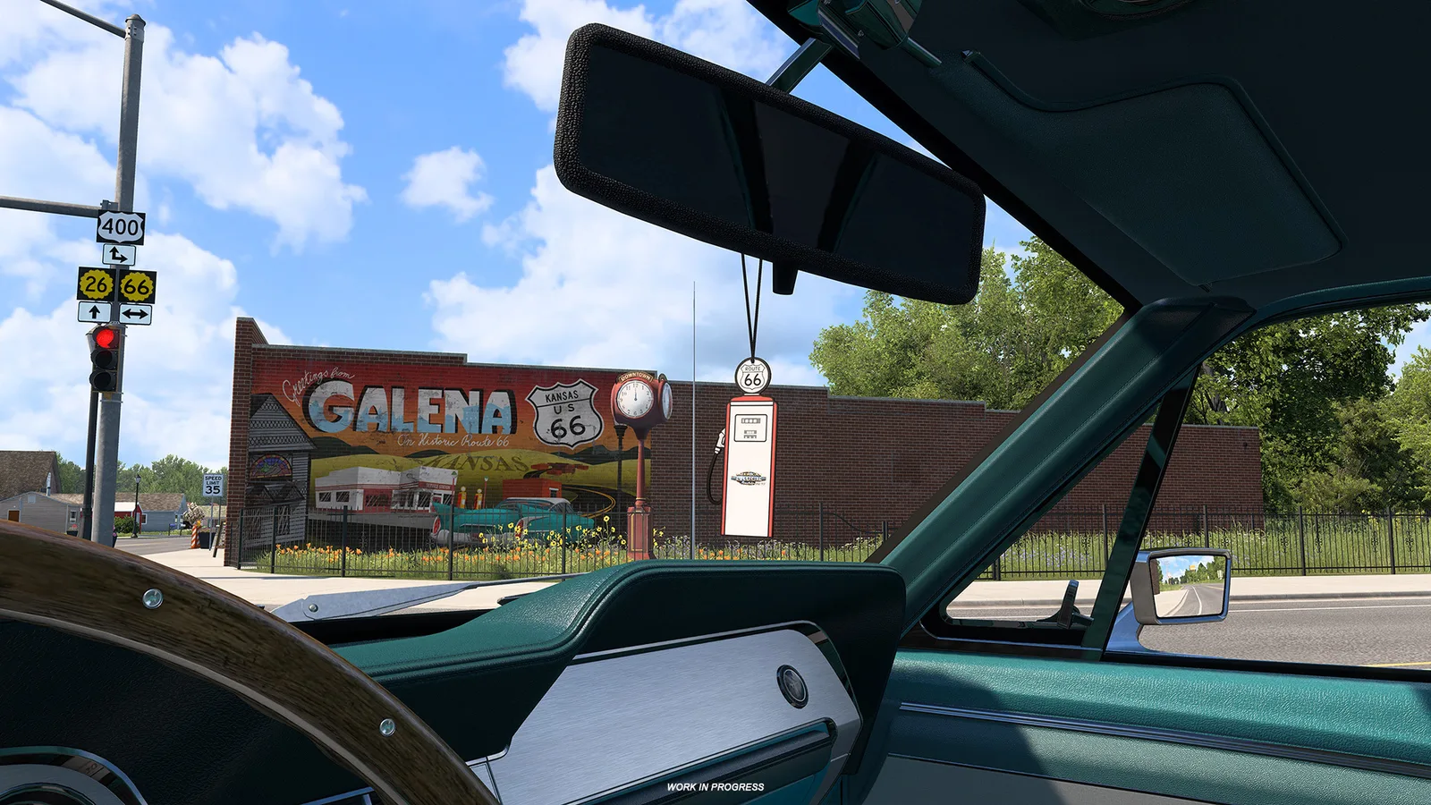 Blick aus einem Oldtimer auf ein Route-66-Schild und ein Wandbild in Galena